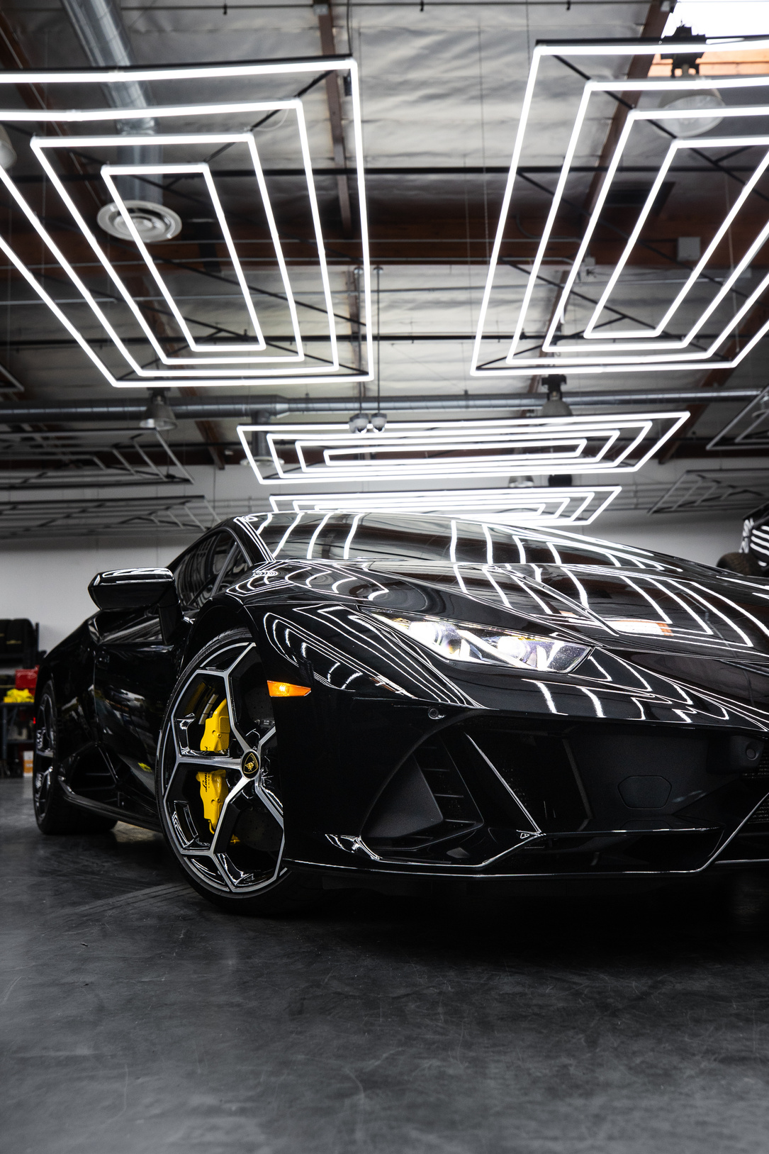 Black Porsche 911 Parked in Garage