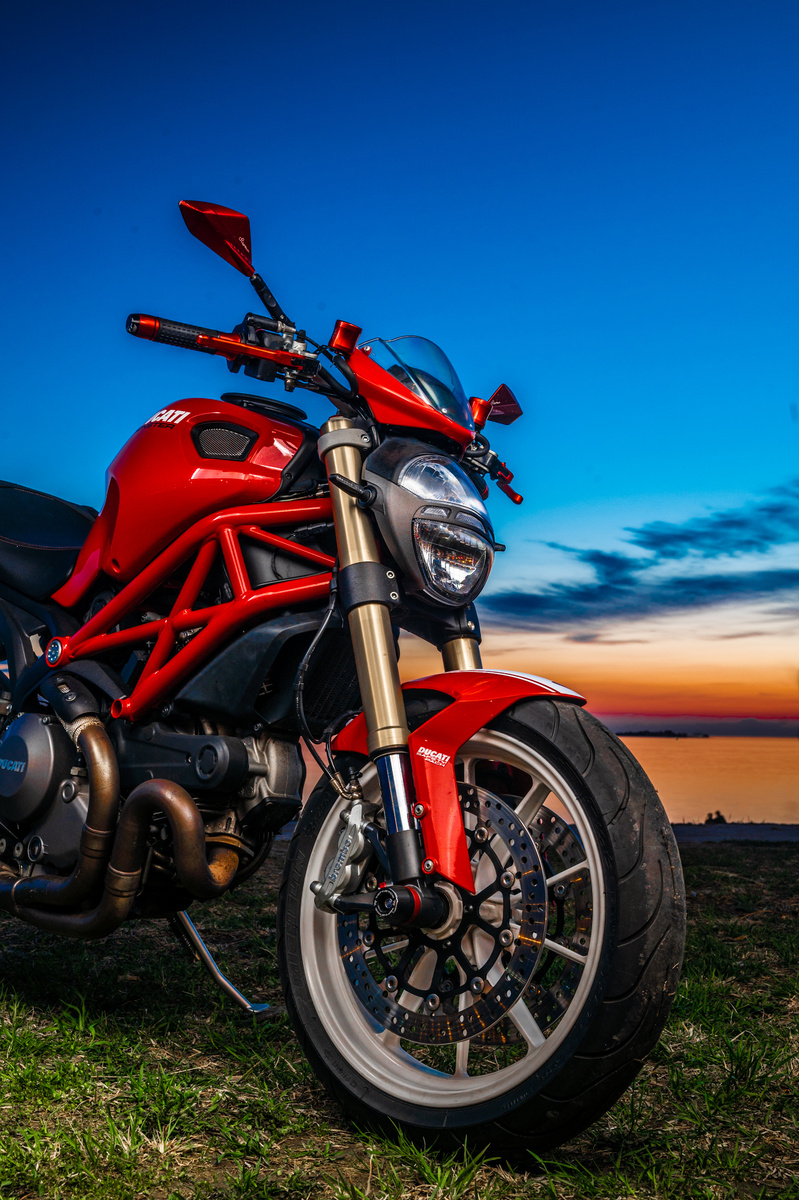 Red Motorcycle Under Blue Sky